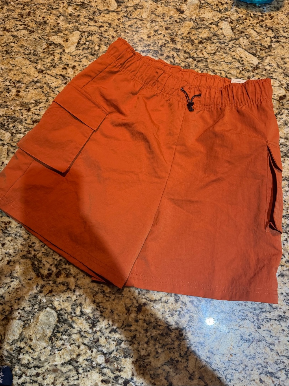 Nike women’s Rust Orange Cargo Drawstring Shorts athletic shorts
